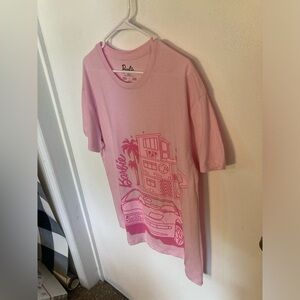 Barbie short sleeve t-shirt in size Large. Pink with Barbie dream house. NWOT